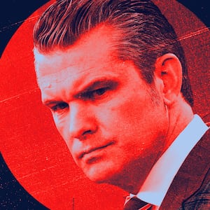 Pete Hegseth in a spotlight.