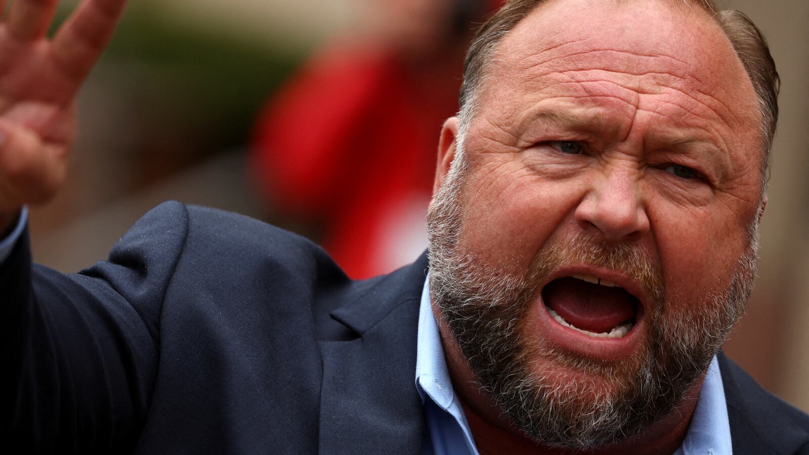 Infowars founder Alex Jones speaks to the media after appearing at his Sandy Hook defamation trial at Connecticut Superior Court in Waterbury, Connecticut, U.S., October 4, 2022.