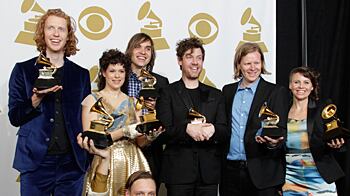 cheats/2011/02/13/arcade-fire-takes-album-of-the-year/arcade-fire-wins-grammy_xk5vsg