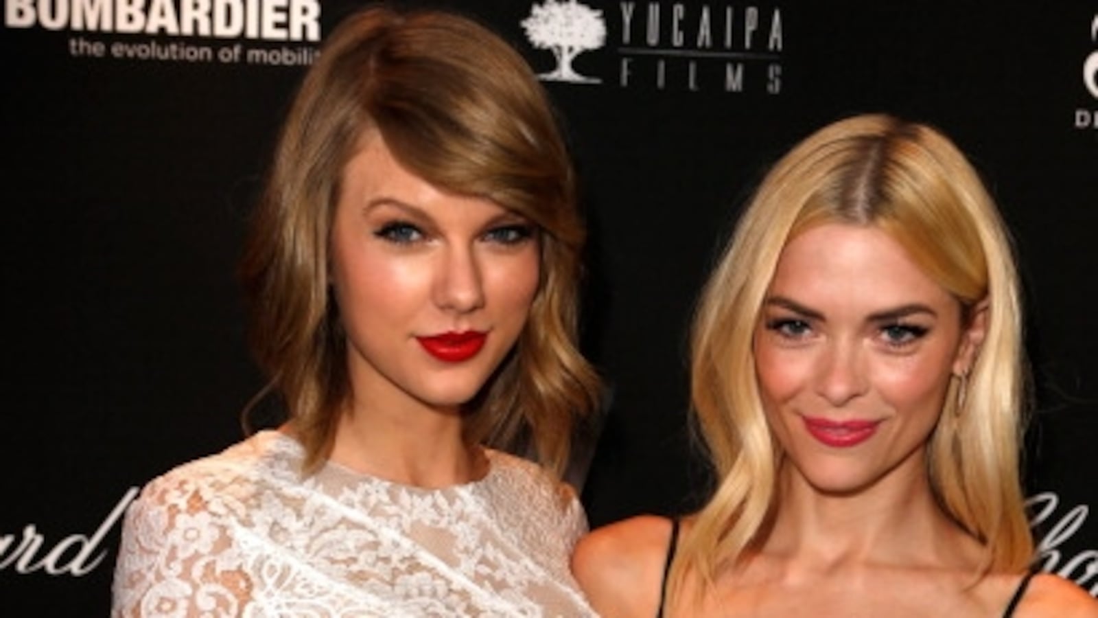 Taylor Swift and Jaime King hugging for. a photo