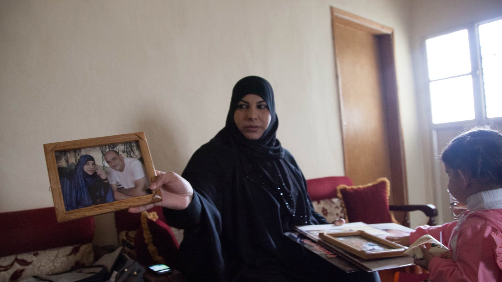 articles/2014/12/26/a-sunni-shia-love-story-imperiled-by-isis/141224-michaelson-isis-tease_wzhd6w