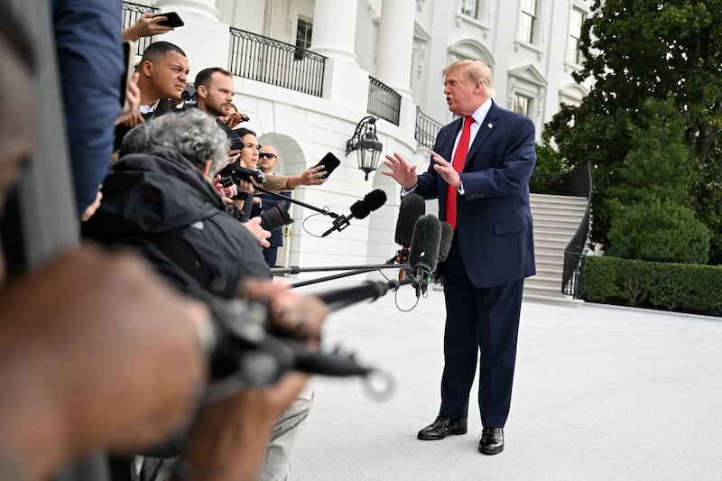 US President Donald Trump speaks to the media as he departs the White House on the South Lawn in Washington, DC, US, September 26, 2026. REUTERS/Annabelle Gordon
