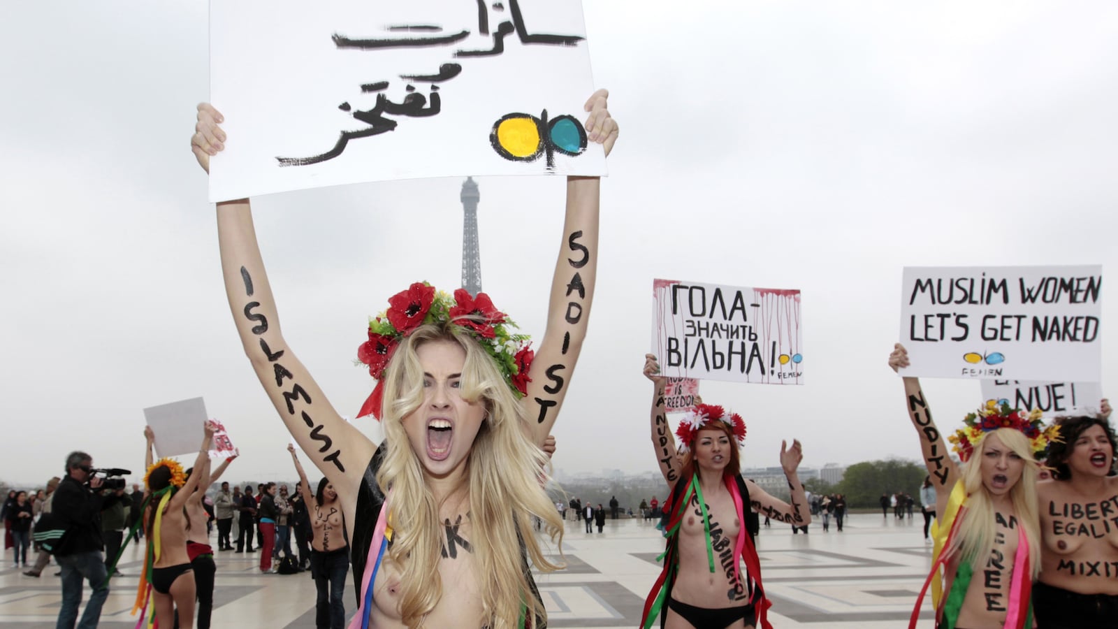 articles/2013/03/30/can-bare-breasts-save-tunisia/130329-giovanni-femen-tunisia-tease_fkylys