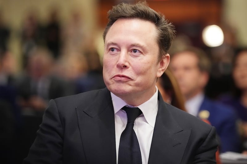 Elon Musk listens at the Hyatt Regency on Capitol Hill on November 13, 2024 in Washington, DC.