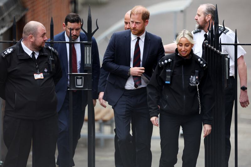 Britain's Prince Harry walks to attend court, for his appeal against the rejection of his legal challenge to the British government's decision to take away his police protection when he is in Britain, outside the High Court in London, Britain, April 9, 2025.