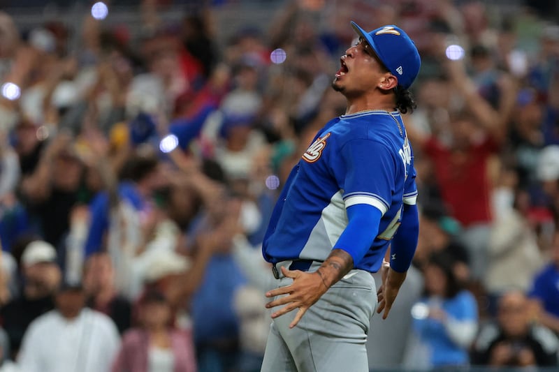Venezuela pitcher Daniel Palencia (29) reacts after getting the final out against the United States  in the ninth inning during the 2026 World Baseball Classic Championship game at loanDepot Park.