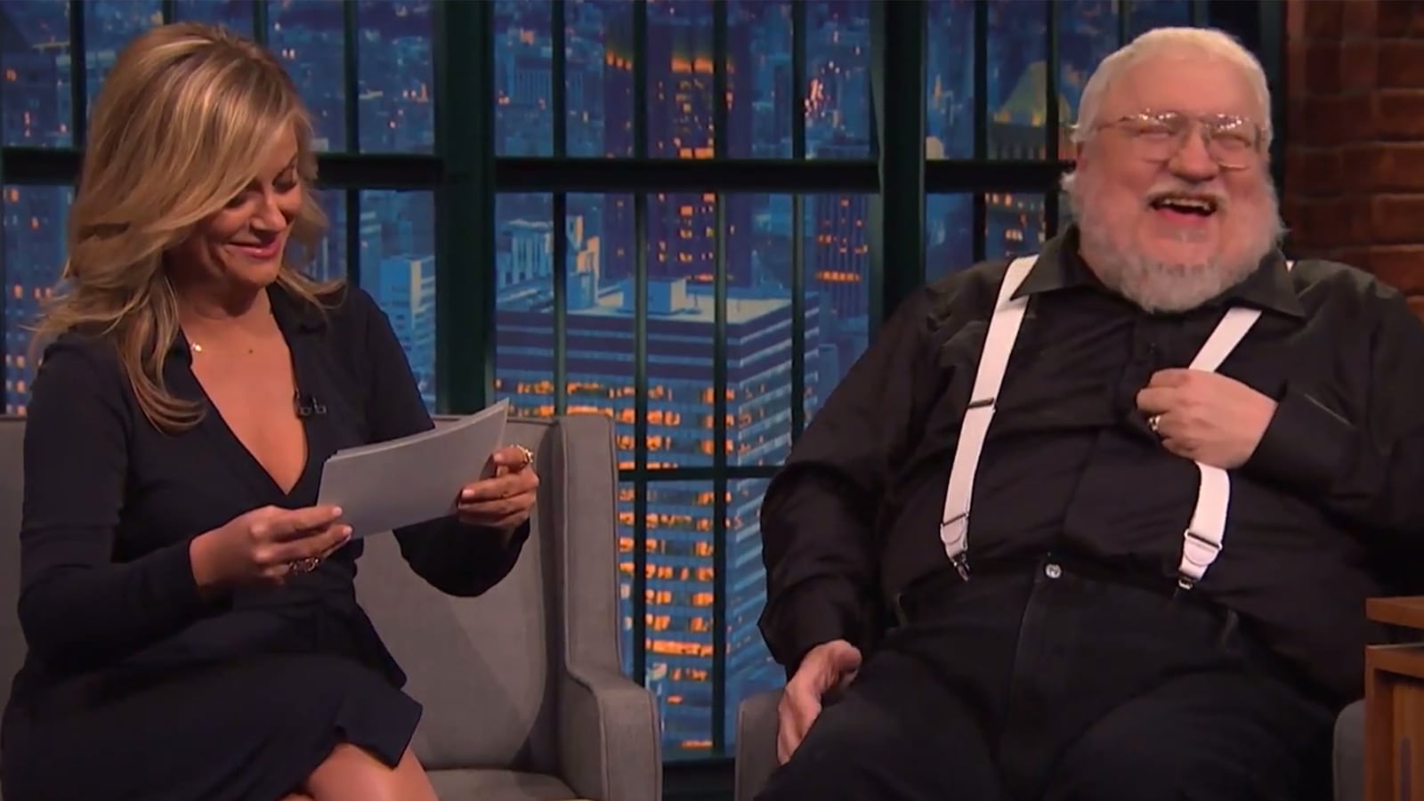 articles/2014/10/29/amy-poehler-and-george-r-r-martin-play-game-of-game-of-thrones/141029-viralvid-thrones-tease_zlfh8p