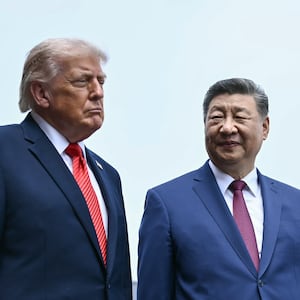BEIJING, CHINA - MAY 14: China's President Xi Jinping (R) and US President Donald Trump visit the Temple of Heaven on May 14, 2026 in Beijing, China. Xi warned Trump that the issue of Taiwan could push their two countries into "conflict" if mishandled, a stark opening salvo as a superpower summit set to tackle numerous thorny issues began in Beijing on May 14. (Photo by Brendan Smialowski - Pool/Getty Images)