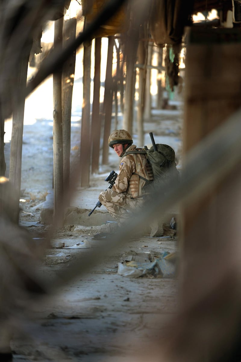 Prince Harry is pictured while on patrol through the deserted town of Garmisir in Helmand province, Southern Afghanistan on January 2, 2008.