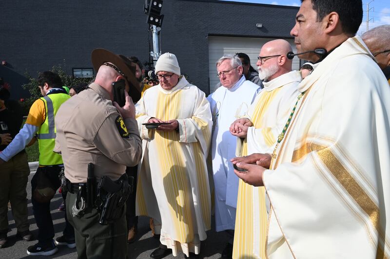 BROADVIEW, ILLINOIS - NOVEMBER 1: A crowd of parishioners, religious sisters, and activists gathers in peaceful assembly during a Eucharistic procession to the Broadview ICE center ,advocating for religious access for detained migrants, in Illinois, United States on November 1, 2025. (Photo by Jacek Boczarski/Anadolu via Getty Images)