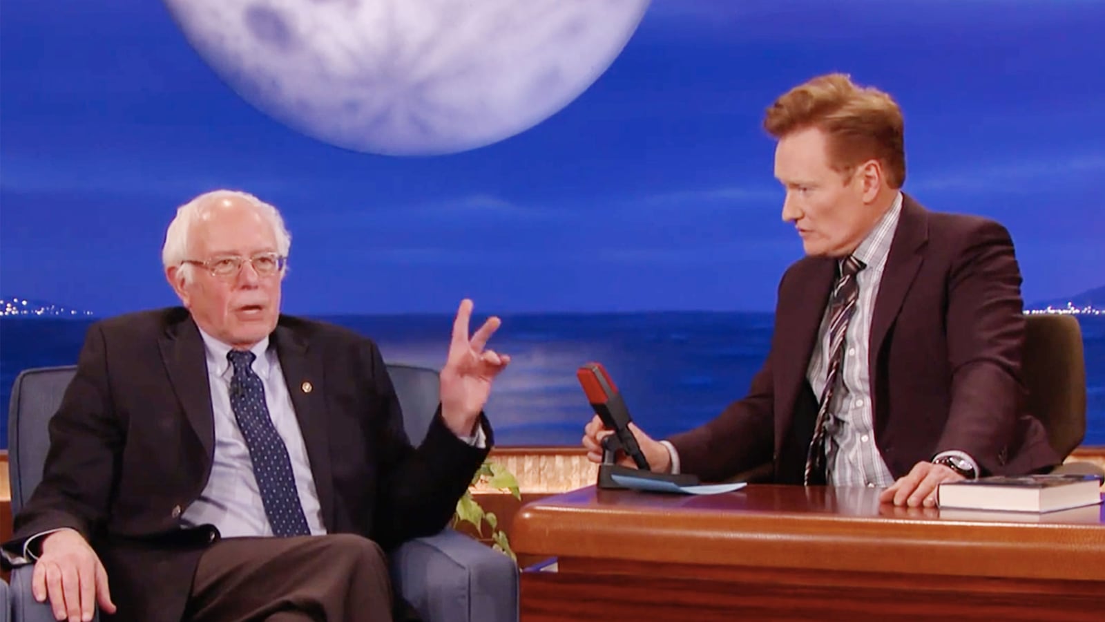 articles/2016/11/30/bernie-sanders-slams-trump-s-totally-insane-tweets-on-conan/161129-wilstein-bernie-sanders-conan-tease_m9msff