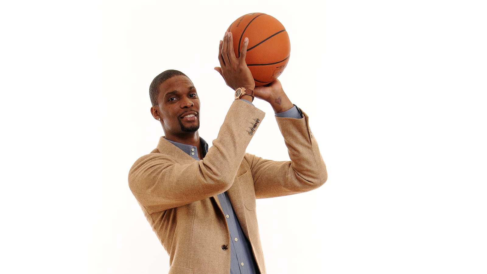 articles/2014/08/13/miami-s-chris-bosh-goes-high-fashion/140812-jjones-bosh-tease_onfdh7