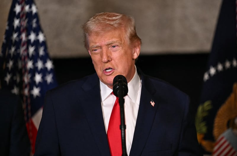 US President Donald Trump takes questions at Mar-a-Lago in Palm Beach, Florida, on December 22, 2025.