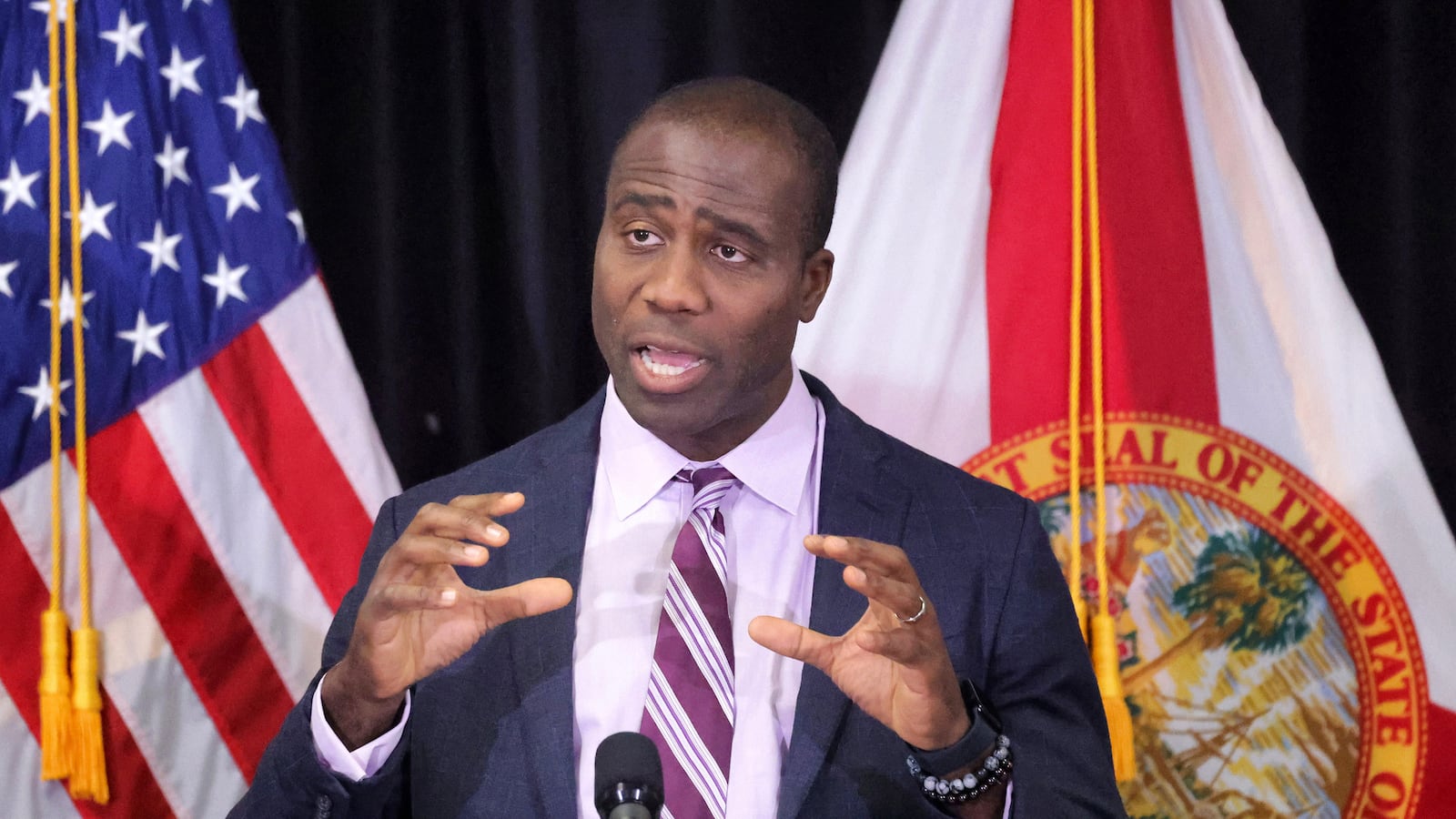 Florida Surgeon General Dr. Joseph Ladapo delivers remarks during a bill-signing ceremony with Florida Gov. Ron DeSantis on April 8, 2024, in Sanford, Florida. Ladapo, a health care skeptic who has been mentioned for possible jobs in the Trump administration, issued an advisory Friday, Nov. 22, 2024, calling on Florida communities to stop fluoridating their water supplies.(Joe Burbank/Orlando Sentinel/Tribune News Service via Getty Images)