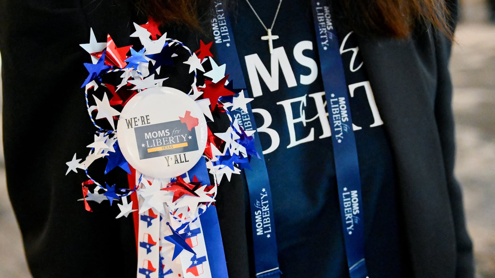 A badge worn by an attendee of the Moms for Liberty summit is seen at the Marriott Hotel in Philadelphia, Pennsylvania, U.S., June 30, 2023.