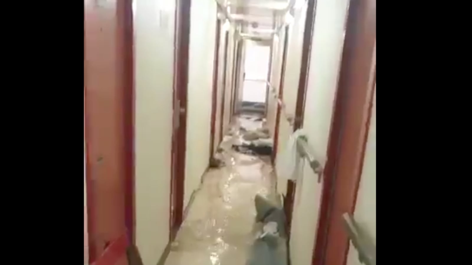 A flooded hallway on a Carnival cruise ship.