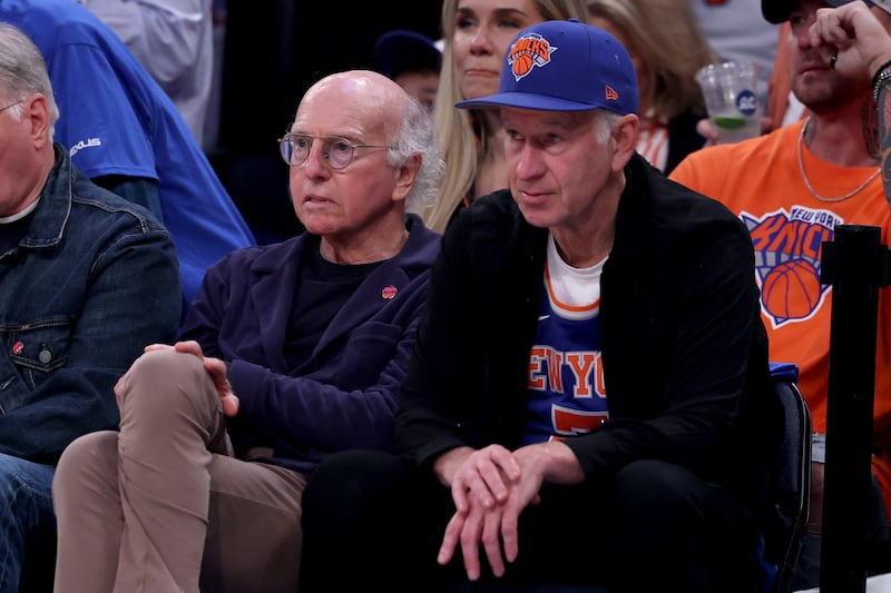Larry David and John McEnroe attend Game Four of the 2026 NBA Finals between the San Antonio Spurs and the New York Knicks at Madison Square Garden on June 10, 2026, in New York City.