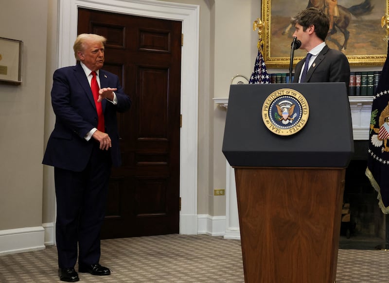 U.S. President Donald Trump gestures after delivering remarks on AI infrastructure, as OpenAI CEO Sam Altman at the Roosevelt room at White House in Washington, U.S., January 21, 2025.