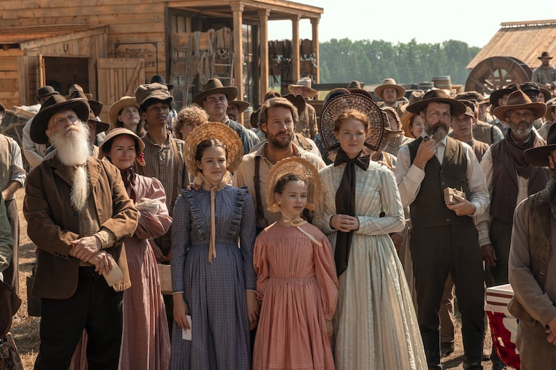 (L-R) Skywalker Hughes as Mary Ingalls, Luke Bracey as Charles Ingalls, Alice Halsey as Laura Ingalls, and Crosby Fitzgerald as Caroline Ingalls.