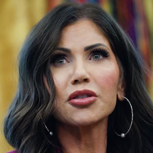 Secretary of Homeland Security Kristi Noem speaks during an event where U.S. President Donald Trump signed a Presidential Memorandum in the Oval Office on September 15, 2025 in Washington, DC.