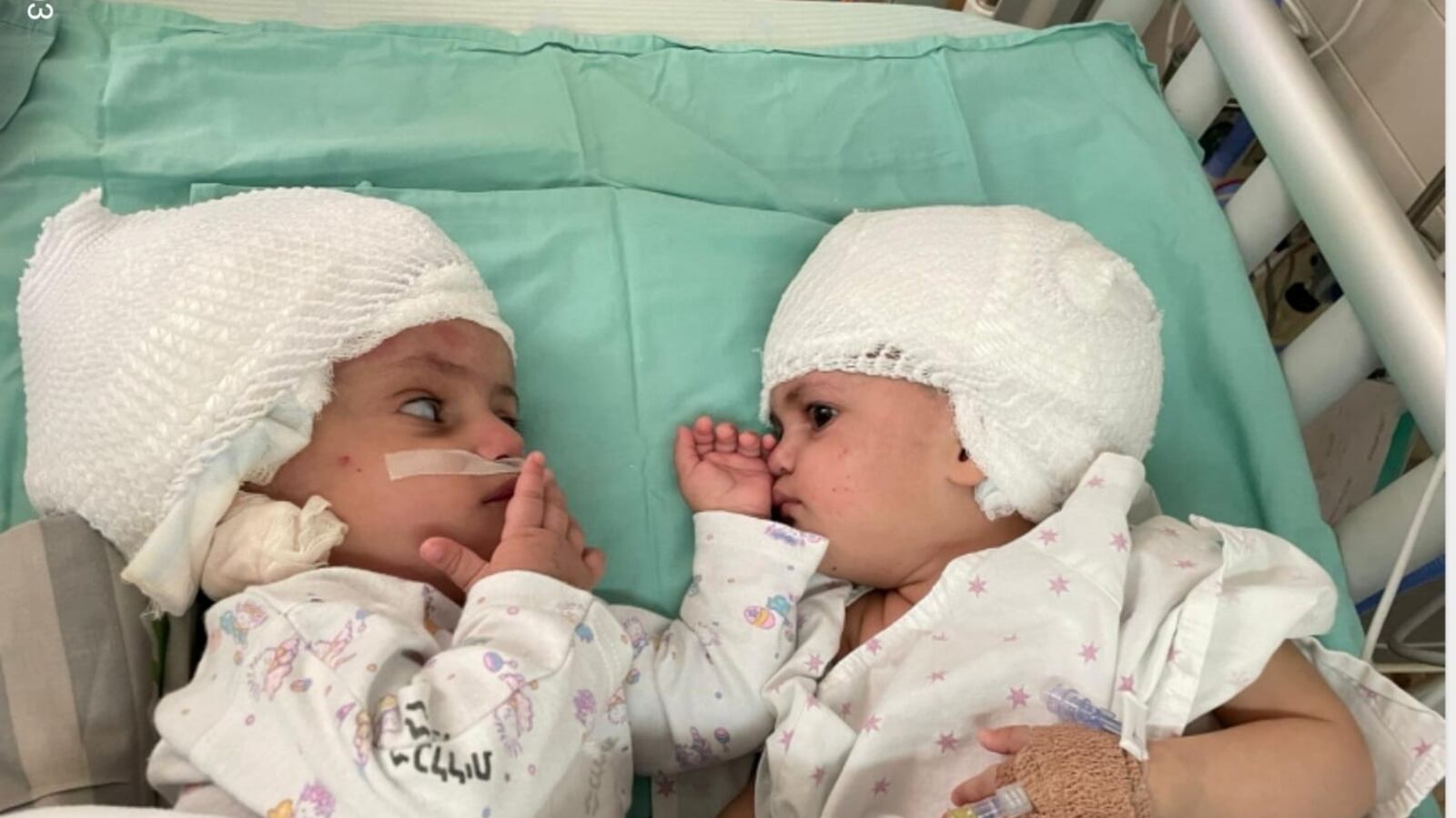 2021-09-05T125036Z_985509166_RC2OJP92230J_RTRMADP_3_HEALTH-ISRAEL-TWINC_a3cdom