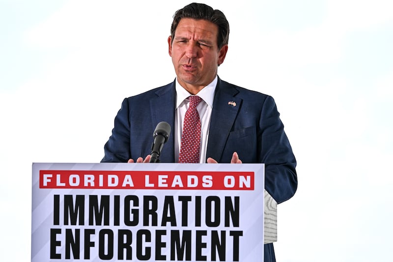 Florida Governor Ron DeSantis speaks during a press conference at the South Florida Detention Facility, nicknamed "Alligator Alcatraz," at the Dade-Collier Training and Transition Airport in Ochopee, Florida, on June 25, 2026. DeSantis announced that the facility is now closed and all detainees have been relocated. (Photo by CHANDAN KHANNA / AFP via Getty Images)