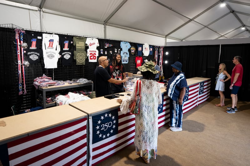 WASHINGTON, DC - JUNE 25: Freedom 250 merchandise is sold on the first day of the "Great American State Fair" on the National Mall on June 25, 2026 in Washington, DC. The Freedom 250-backed Great American State Fair celebrating the 250th anniversary of the United States runs through July 10th. (Photo by Al Drago/Getty Images)