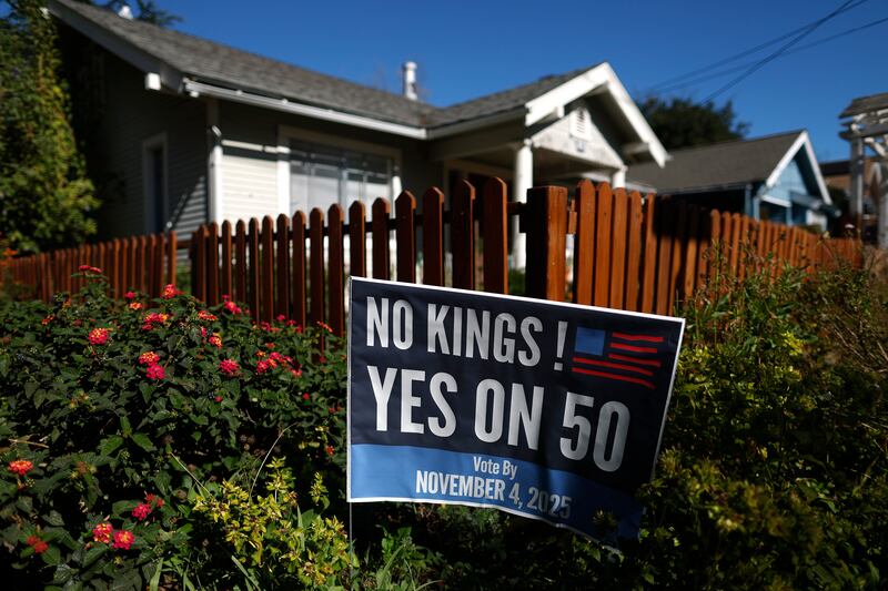No Kings/yes on 50 sign in front of a home in California