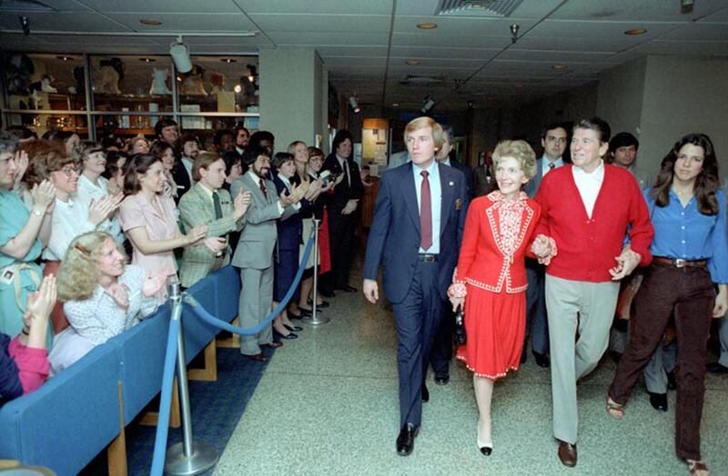 President Reagan leaving George Washington Hospital escorted by Nancy Reagan and daughter Patti Davis in Washington, DC, U.S. on April 11, 1981.