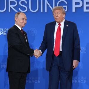 President Donald Trump and Russian President Vladimir Putin shake hands at the end of a press conference at Joint Base Elmendorf-Richardson on August 15, 2025 in Anchorage, Alaska where they did not take any questions and did not reveal anything had been achieved at their meeting besides a promise for more talks.