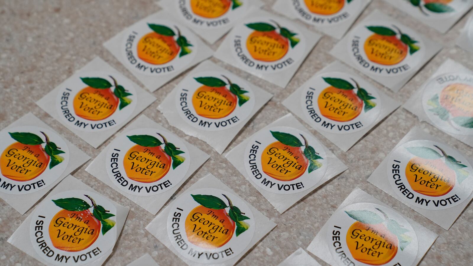 Stickers lay on a table in a polling location as early voting begins for the midterm elections in Columbus, Georgia, U.S. October 17, 2022.