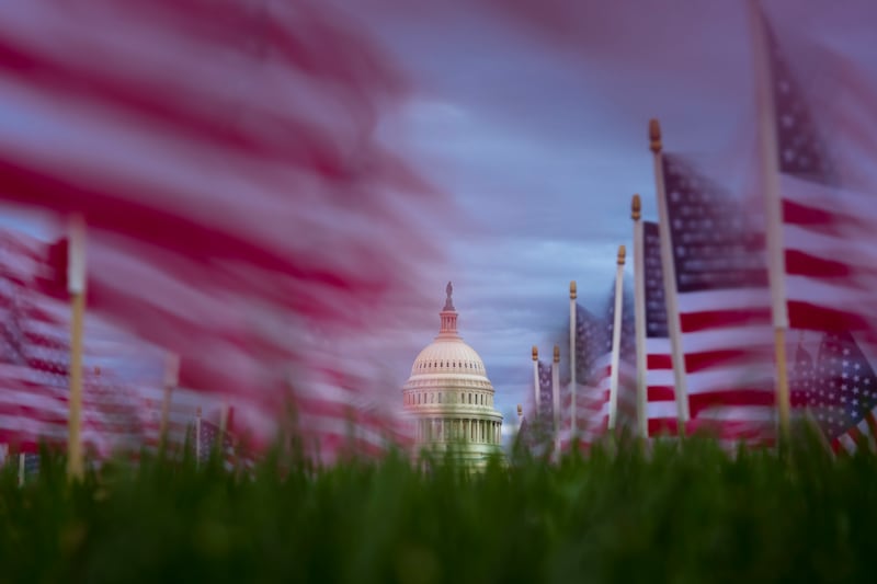 American flags fly in the wind along the National Mall on November 10, 2025 on Capitol Hill in Washington, D.C.