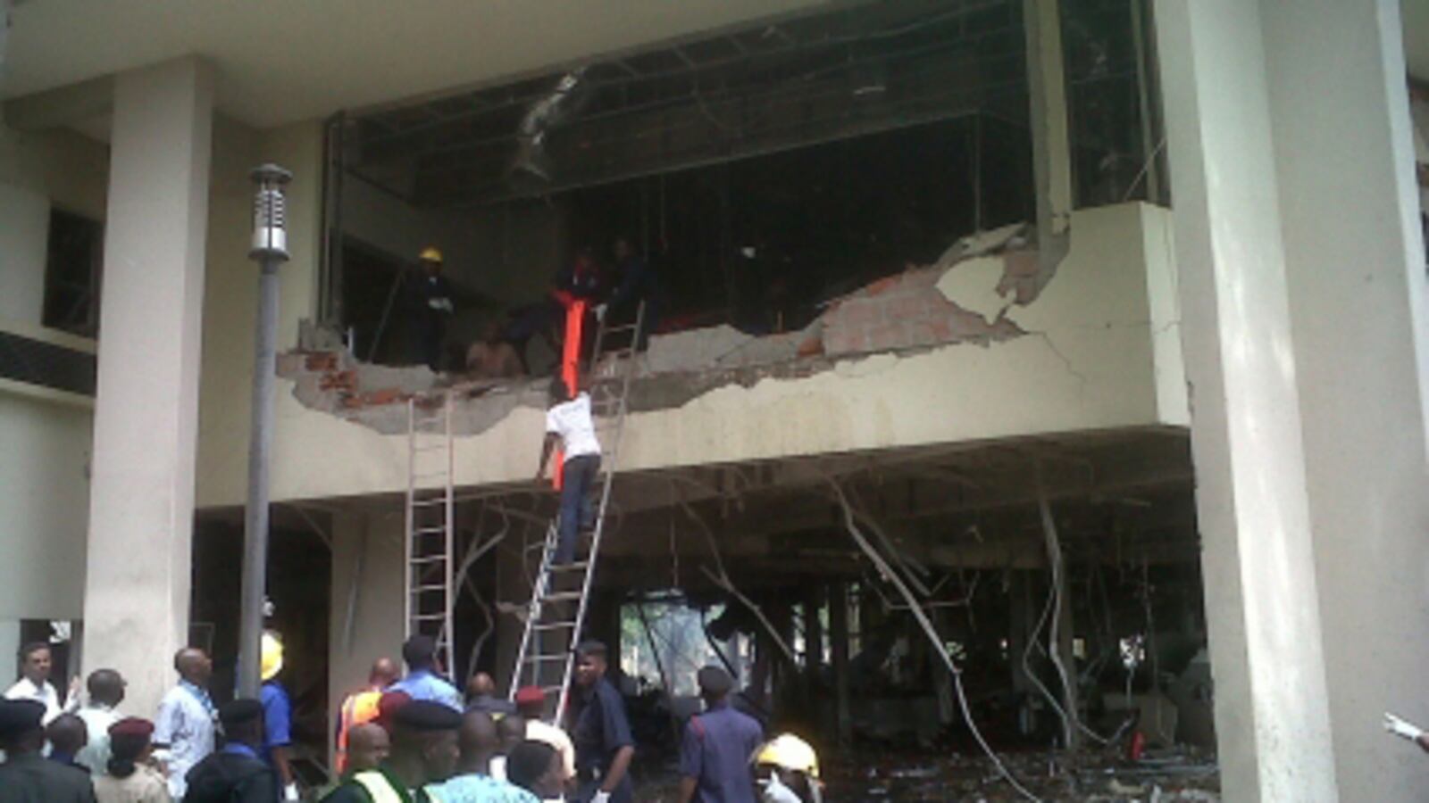 cheats/2011/08/26/bomb-hits-u-n-building-in-nigeria/nigeria-explosion-united-nations-cheat_r8h2jq