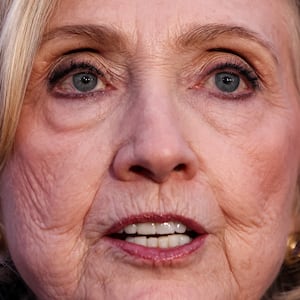 TOPSHOT - Former US Secretary of State Hillary Clinton speaks to the press after her a deposition with the House Oversight Committee as they investigate links to convicted sex offender Jeffrey Epstein, in Chappaqua, New York, on February 26, 2026. Clinton testified behind closed doors on Thursday before a congressional committee investigating the late convicted sex offender Jeffrey Epstein and his accomplice Ghislaine Maxwell. Former president Bill Clinton is scheduled to answer questions the following day from the Republican-led House Oversight Committee about his relations with Epstein, who died in a New York jail cell in 2019 while awaiting trial. (Photo by CHARLY TRIBALLEAU / AFP via Getty Images)