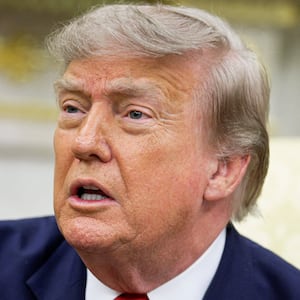 U.S. President Donald Trump points his finger as he participates in a bilateral meeting with Iraqi Prime Minister Ali al-Zaidi (not pictured) in the Oval Office at the White House in Washington, D.C., U.S., July 14, 2026. REUTERS/Evan Vucci