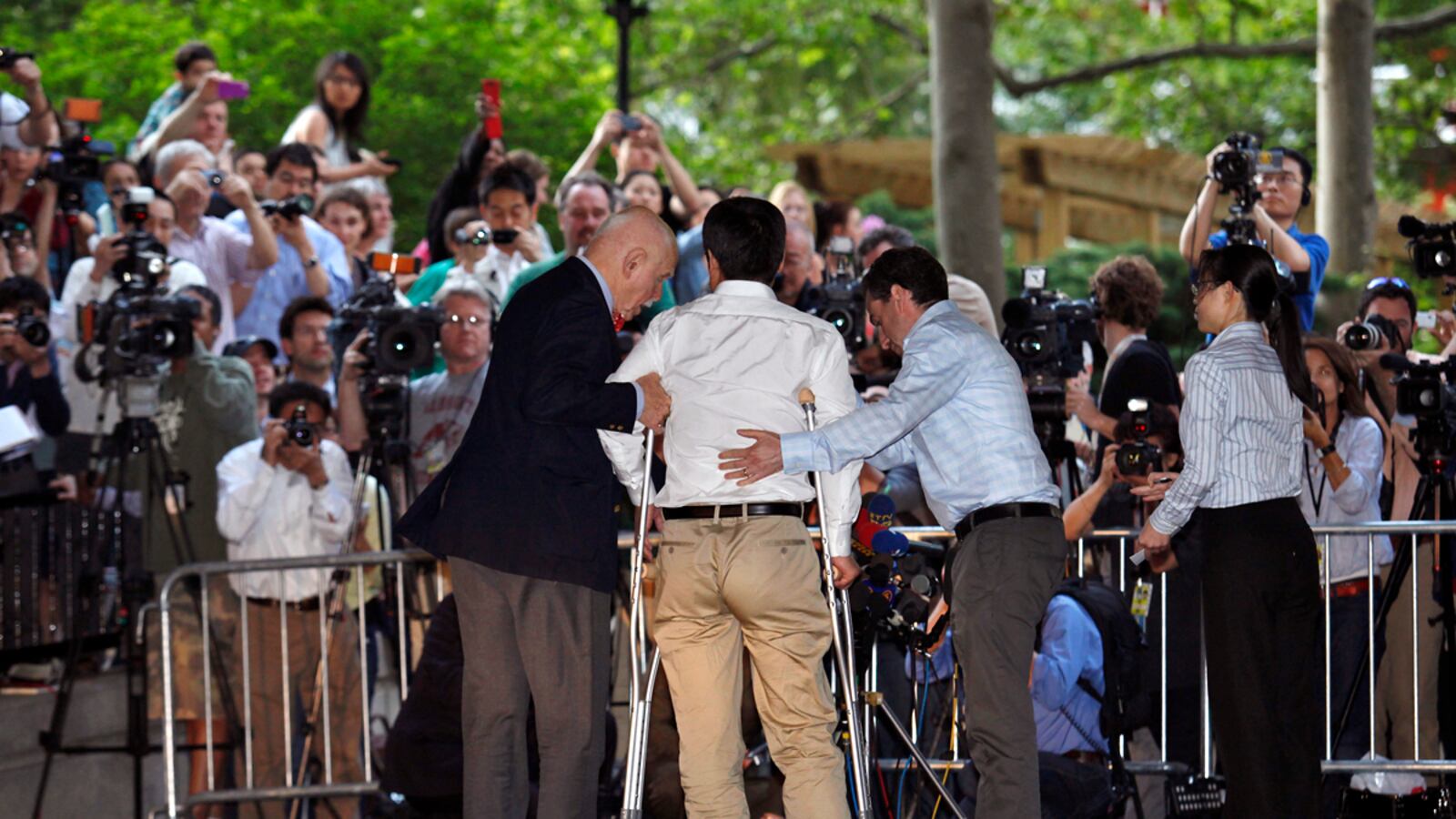 articles/2012/05/19/guangcheng-s-flight-to-freedom/chen-arrives-in-nyc-liu_pfmbhe