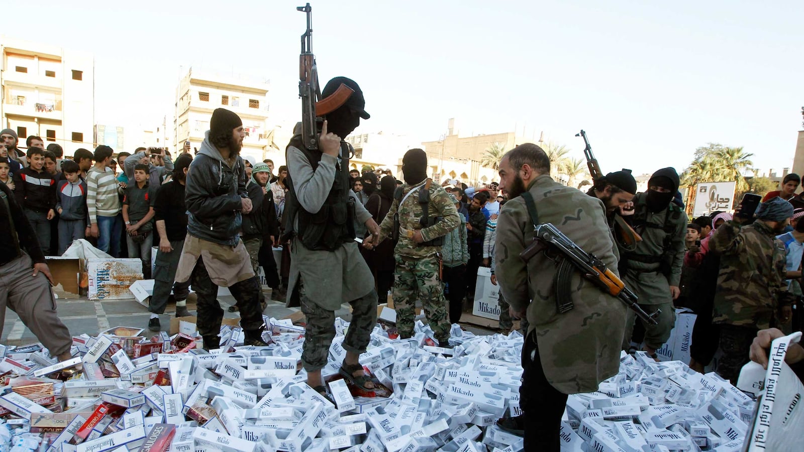 articles/2015/03/30/smokers-rebel-against-isis-cig-ban/150328-niqash-isis-restricts-smoking-tease_sgih8d
