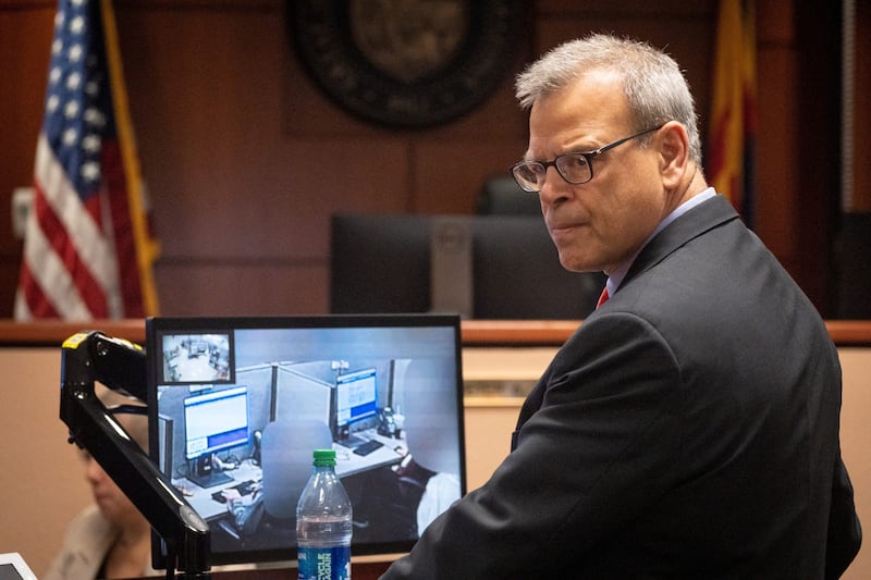 Kurt Olsen looks on during his opening statement in Kari Lake's election challenge trial in Maricopa County Superior Court in Phoenix, Arizona, U.S.