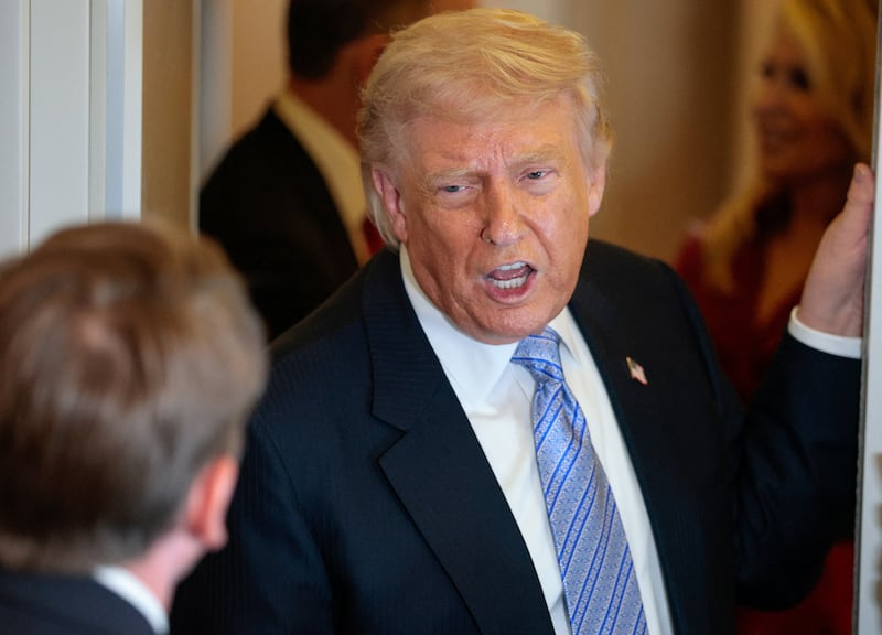 U.S. President Donald Trump speaks to the press aboard Air Force One enroute to the U.S.  following his official visit with President Xi Jinping in China, May 15, 2026.