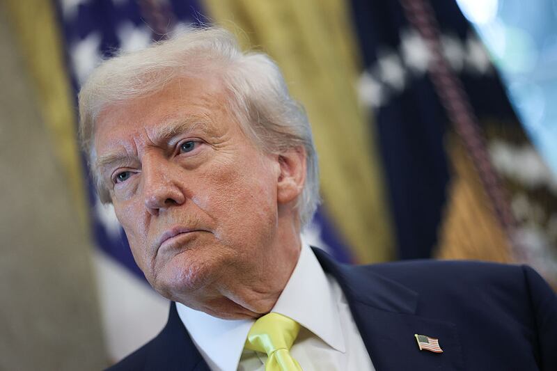 WASHINGTON, DC - AUGUST 07: U.S. President Donald Trump listens to questions from reporters after speaking on economic data  in the Oval Office on August 07, 2025 in Washington, DC. Trump fired Bureau of Labor Statistics Commissioner Dr. Erika McEntarfer on August 1st, claiming the agency issued “phony” jobs numbers during the Biden administration to aid Democrats.  (Photo by Win McNamee/Getty Images)