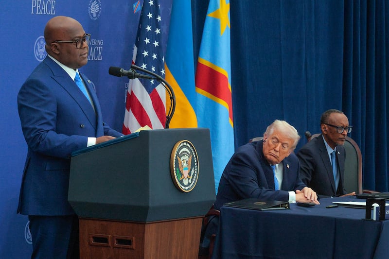 Democratic Republic of Congo President Felix Tshisekedi (L) speaks during a peace accord signing ceremony between himself and Rwandan President Paul Kagame (R) hosted by President Donald Trump the at the Donald J. Trump Institute of Peace on December 04, 2025 in Washington, DC.