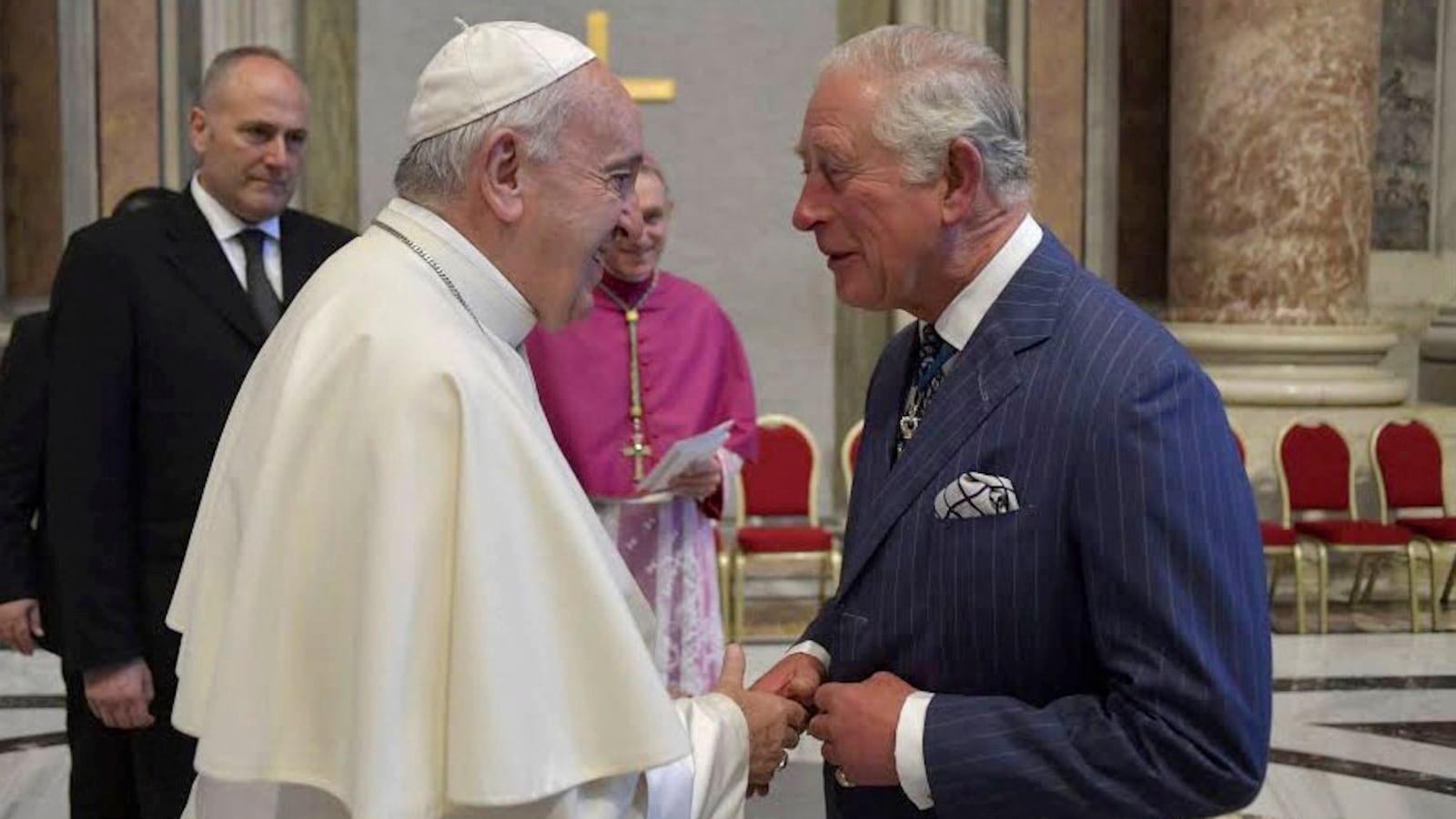 King Charles (then Prince of Wales) shakes hands with Pope Francis during the canonization of Cardinal Newman at St. Peter's Square in 2019 in Vatican City, Vatican.
