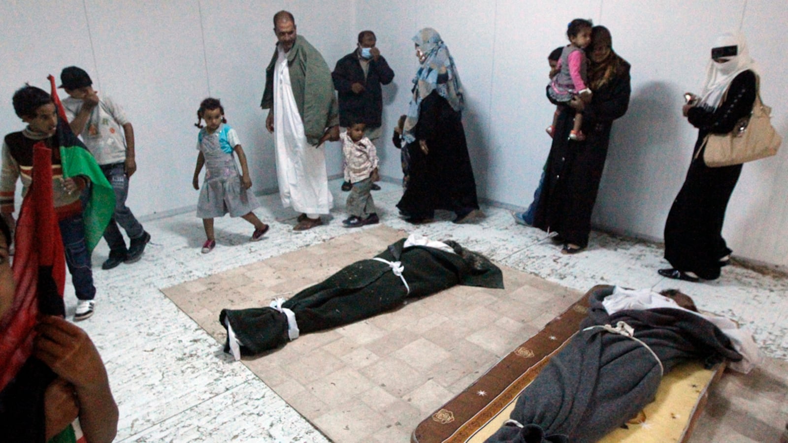 cheats/2011/10/24/libya-asks-who-killed-gaddafi/gaddafi-death-investigation-cs_zgvcui