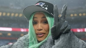 DENVER, COLORADO - JANUARY 25: Artist Cardi B poses for a photo following the AFC Championship Playoff game against the Denver Broncos at Empower Field At Mile High on January 25, 2026 in Denver, Colorado. The New England Patriots defeat the Denver Broncos 10-7. (Photo by Matthew Stockman/Getty Images)