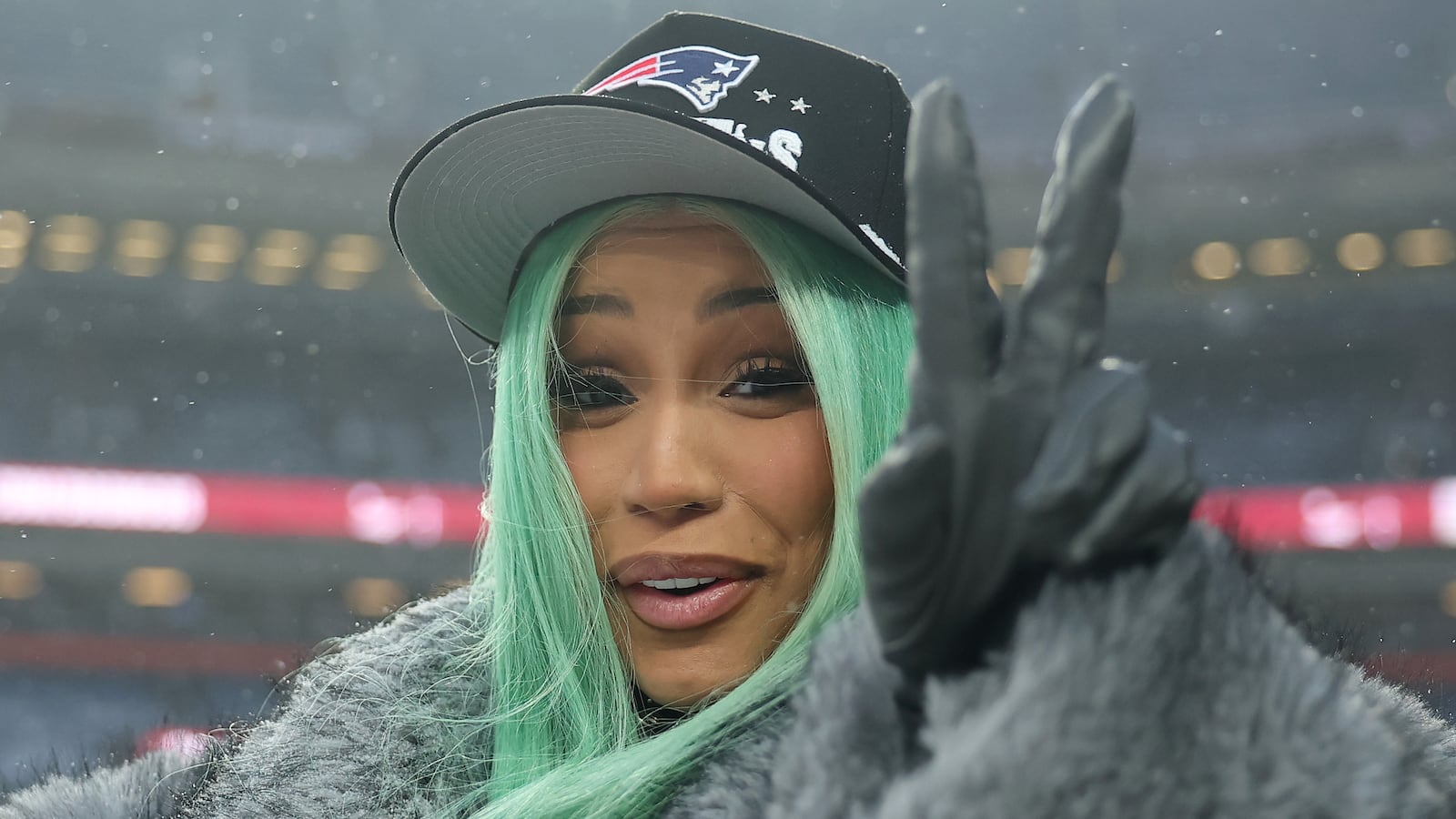 DENVER, COLORADO - JANUARY 25: Artist Cardi B poses for a photo following the AFC Championship Playoff game against the Denver Broncos at Empower Field At Mile High on January 25, 2026 in Denver, Colorado. The New England Patriots defeat the Denver Broncos 10-7. (Photo by Matthew Stockman/Getty Images)