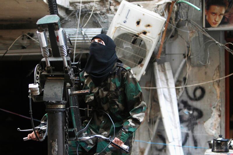 galleries/2013/06/29/week-in-photos-june-29-2013/130627-syria-soldier-wip_zqgoc9