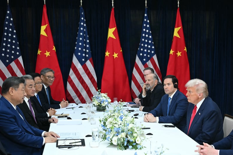 US President Donald Trump (R) and China's President Xi Jinping (L) hold talks at the Gimhae Air Base, located next to the Gimhae International Airport in Busan on October 30, 2025. Donald Trump and Chinese leader Xi Jinping will seek a truce in their bruising trade war on October 30, with the US president predicting a "great meeting" but Beijing being more circumspect. (Photo by ANDREW CABALLERO-REYNOLDS / AFP) (Photo by ANDREW CABALLERO-REYNOLDS/AFP via Getty Images)