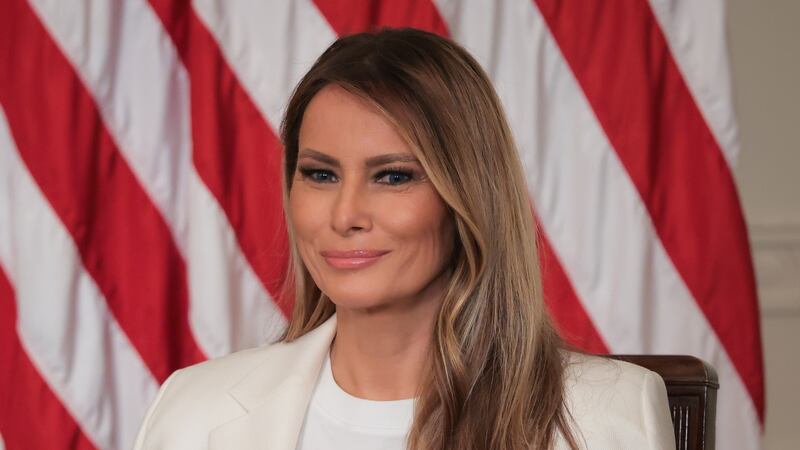 First lady Melania Trump looks on during the unveiling of a U.S. Postal Service stamp honoring former first lady Barbara Bush in the East Room at the White House on May 08, 2025 in Washington, DC. The stamp honors Bush, whose husband was President George H.W. Bush, and son was President George W. Bush. Barbara Bush passed away in 2018 at the age of 92.