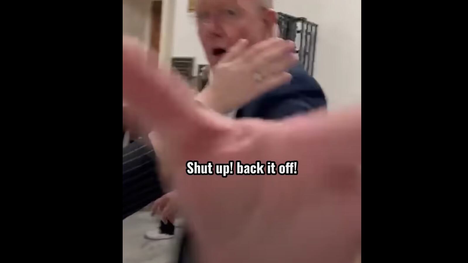 Mike Ezell has been accused of assaulting a Palestinian-American activist by slapping a cellphone from her hand.