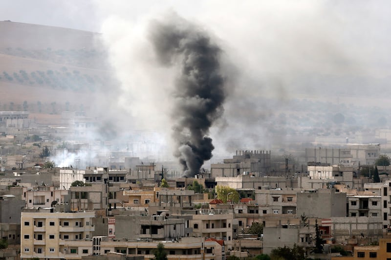 galleries/2014/10/08/unrest-in-kobani/141013-kobani-attack4_pv2pbf